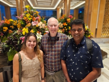 Mackinzie Reinert poses with Center for Health and Hope leaders